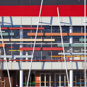 View of Claudlands Arena, Hamilton. - View of architecture, building, commercial building, corporate headquarters, facade, line, metropolitan area, residential area, sky, sport venue, structure, urban area
