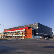 External view of Claudlands arena in Hamilton - architecture, building, city, commercial building, corporate headquarters, facade, infrastructure, metropolitan area, real estate, sky, structure, teal