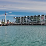 View of the Viaduct Events Center in Auckland's coastal and oceanic landforms, dock, harbor, marina, port, recreation, sea, sky, water, water transportation, teal, gray