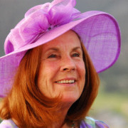 This is designer Mieke Solari of Touch of fun, hat, headgear, pink, purple, smile, sun hat, gray