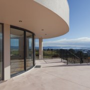 These windows were created with Glasshape's new curved apartment, architecture, balcony, condominium, daylighting, daytime, estate, house, property, real estate, sky, window, gray