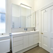 Bathroom with grey tiled flooring, and white vanity, bathroom, bathroom accessory, bathroom cabinet, floor, home, interior design, real estate, room, sink, white