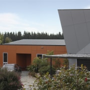 Resene provided the paints used for the exterior architecture, cottage, facade, home, house, property, real estate, roof, shed, siding, brown, white