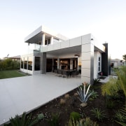 This house was designed and built by Signature architecture, building, elevation, estate, facade, home, house, property, real estate, residential area, villa, white