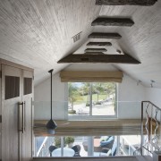 This homes' kitchen was designed by Mick De architecture, ceiling, daylighting, home, house, interior design, real estate, window, gray