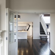 View fo dining area, living area and new door, floor, flooring, hardwood, home, house, interior design, room, window, gray