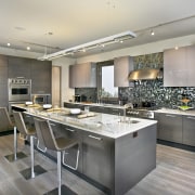 The interior of this home was designed by cabinetry, countertop, cuisine classique, interior design, kitchen, room, gray
