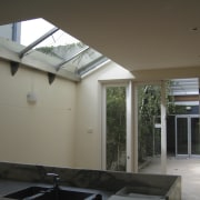 Before image of the kitchen and rear yard architecture, ceiling, daylighting, glass, house, interior design, real estate, roof, window, gray, black