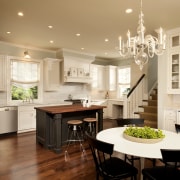 View of kitchen designed by Nadia Subaran. Designed cabinetry, ceiling, countertop, cuisine classique, home, interior design, kitchen, room, orange