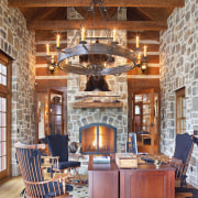 View of desk and seats with stone fireplace ceiling, dining room, fireplace, hardwood, hearth, home, interior design, living room, room, wall, wood, brown