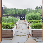 View of stone pathway and planter boxes. - backyard, balcony, handrail, home, outdoor structure, plant, property, real estate, walkway