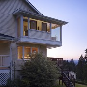 View of exterior of house with cream weatherboards architecture, building, cottage, elevation, estate, facade, home, house, property, real estate, residential area, siding, sky, window, black, teal