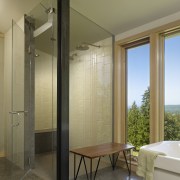 View of bathroom with grey flooring and small ceiling, interior design, window, brown