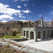 This home in Queenstown was renovated by architect cloud, historic site, mountain, sky
