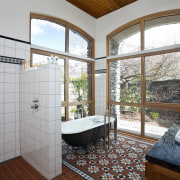 Bathroom with floor mat, free standing pub and bathroom, daylighting, estate, home, house, property, real estate, room, window, gray, white