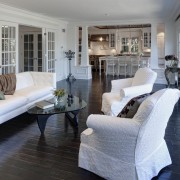 View of living area in 1950's remodelled lakefront ceiling, estate, floor, flooring, hardwood, home, house, interior design, living room, real estate, room, wall, window, wood, wood flooring, gray