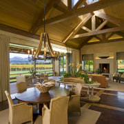 View of kitchen, great room and wine cellar. dining room, estate, interior design, living room, real estate, resort, brown