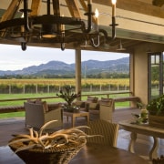 View of kitchen, great room and wine cellar. estate, home, interior design, living room, property, real estate, resort, window, brown