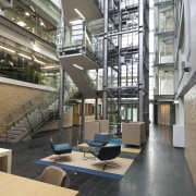 Here is a view of the new Telecom apartment, architecture, building, condominium, daylighting, interior design, lobby, mixed use, gray