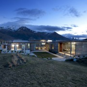 This home was designed by architect Nick Karlovsky. architecture, cloud, cottage, elevation, estate, evening, home, house, landscape, lighting, mountain, mountain range, property, real estate, residential area, roof, sky, blue, black