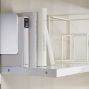 Photography of the "FloatingSpaces" system by SieMatic. furniture, product, product design, shelf, shelving, gray