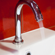 Merquip designed the electronic touch-free tap-ware for this plumbing fixture, product, product design, sink, tap, red, white