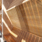 The acoustic timber panelling seen here in this architecture, ceiling, daylighting, interior design, light, lighting, line, material, wood, wood stain, orange, brown