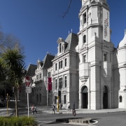 Here is a view of the Auckland Art architecture, building, city, daytime, downtown, estate, facade, house, landmark, metropolis, metropolitan area, neighbourhood, residential area, sky, street, town, tree, blue