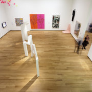Here is a view of the hardwood flooring art gallery, exhibition, floor, flooring, furniture, hardwood, interior design, laminate flooring, product design, room, table, wood, wood flooring, white, orange