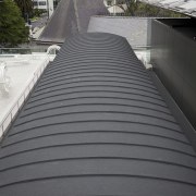 Auckland Waterproofing ensured that this, the Auckland Art architecture, building, daylighting, infrastructure, line, outdoor structure, roof, walkway, gray, black