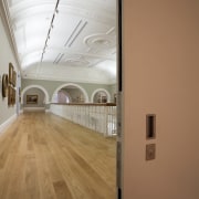 Here is a view of the architectural door architecture, ceiling, daylighting, floor, flooring, hardwood, house, interior design, laminate flooring, wall, wood, wood flooring, brown