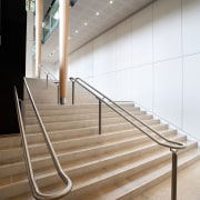 Here is a view of the work done architecture, daylighting, floor, flooring, glass, handrail, interior design, line, product design, stairs, gray, brown