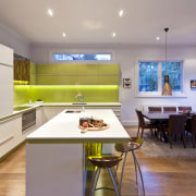 View of contemporary kitchen with wooden flooring and interior design, kitchen, real estate, room, table, gray