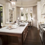 View of kitchen with dark wooden flooring and cabinetry, countertop, cuisine classique, dining room, home, interior design, kitchen, room, window, gray, brown