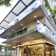 This home was designed with environmental principals in architecture, building, condominium, daylighting, facade, home, house, mixed use, real estate, window, white