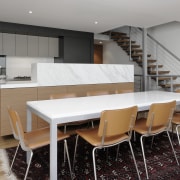 View of kitchen and dining area, with wooden countertop, interior design, kitchen, table, gray