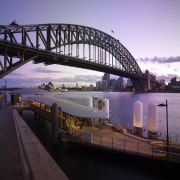 Seen here is a new building on the bridge, dusk, evening, fixed link, morning, night, reflection, river, sky, water, waterway, black, purple