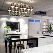 View of contemporary kitchen with lighting feature, black ceiling, countertop, interior design, kitchen, product design, table, gray, white