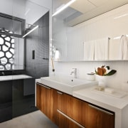 This precinct was developed by Mirvac. Here is bathroom, countertop, interior design, product design, room, sink, white, gray