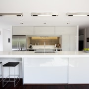 View of contemporary kitchen with white cabinetry, wooden cabinetry, countertop, cuisine classique, interior design, kitchen, real estate, room, white