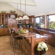 View of kitchen with wooden flooring and island countertop, cuisine classique, estate, interior design, kitchen, real estate, brown, white