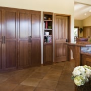 View of kitchen with wooden flooring and island cabinetry, countertop, door, floor, flooring, hardwood, home, interior design, kitchen, real estate, room, wood, wood flooring, brown