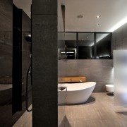 This home was designed by Gerrad Hall, the architecture, bathroom, floor, interior design, product design, room, sink, black