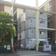 Royal Wolf Australia Pty Limited provided onsite accommodation apartment, architecture, building, city, condominium, facade, house, metropolitan area, mixed use, neighbourhood, real estate, residential area, tower block, window, gray