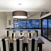 View of dining area with wooden table and ceiling, dining room, interior design, real estate, room, window, gray