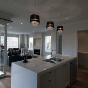 This home was designed and built by Jalcon ceiling, countertop, interior design, kitchen, property, real estate, room, gray, black