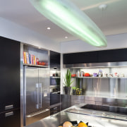 View of contemporary kitchen with stainless fridge and ceiling, interior design, gray