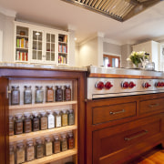 View of liquor cabinet and wooden flooring. - cabinetry, furniture, interior design, kitchen, wood, red