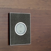 View of home automation system on wooden wall. circle, product, product design, brown