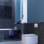View of contemporary bathroom with blue wall. - angle, bathroom, bidet, blue, floor, flooring, interior design, plumbing fixture, product design, purple, room, tap, tile, wall, teal, blue